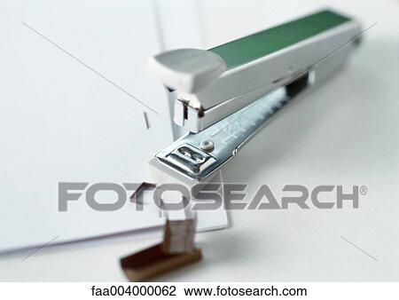 Stapler and staples View Large Photo Image Stock Image - Stapler and staples. Fotosearch
