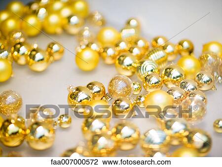 Strands of gold beads View Large Photo Image Stock Image - Strands of gold beads. Fotosearch