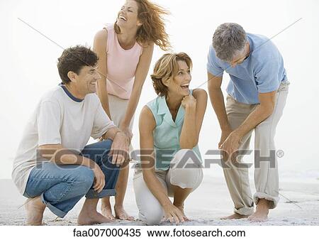 Two mature couples on beach View Large Photo Image Stock Photography - Two mature couples on beach. Fotosearch
