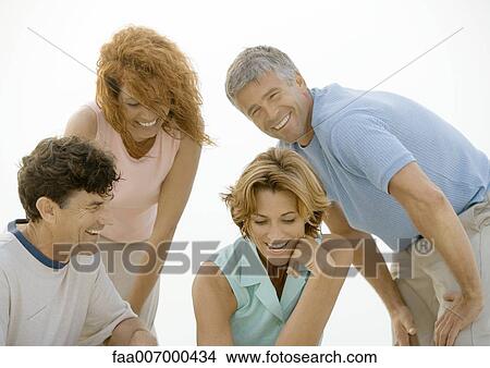 Two mature couples View Large Photo Image Picture - Two mature couples. Fotosearch