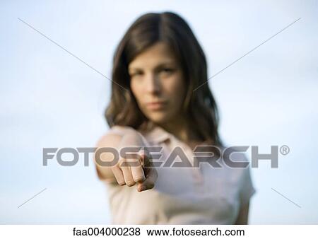 Woman pointing at camera View Large Photo Image Stock Photo - Woman pointing at camera. Fotosearch