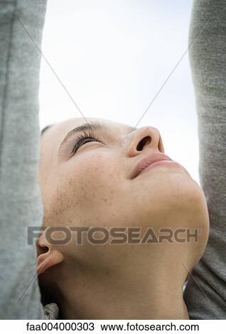 Woman reaching up, close-up View Large Photo Image Stock Image - Woman reaching up, close-up. Fotosearch