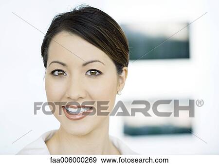 Woman smiling, close-up, portrait View Large Photo Image Stock Photo - Woman smiling, close-up, portrait. Fotosearch