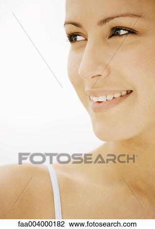 Woman smiling, close-up View Large Photo Image Stock Image - Woman smiling, close-up. Fotosearch