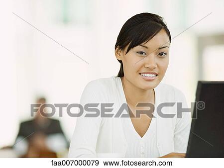 Woman smiling View Large Photo Image Stock Photo - Woman smiling. Fotosearch