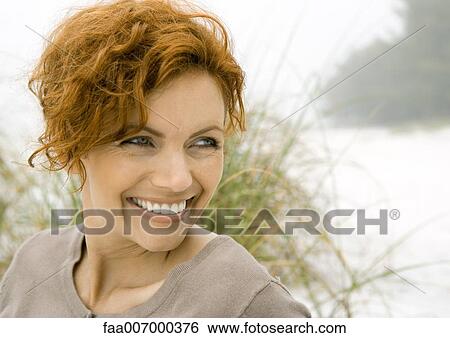 Stock Photograph - Woman smiling. Fotosearch