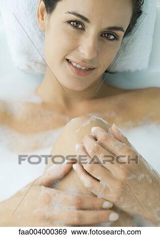 Woman taking bubble bath View Large Photo Image Stock Photo - Woman taking bubble bath. Fotosearch