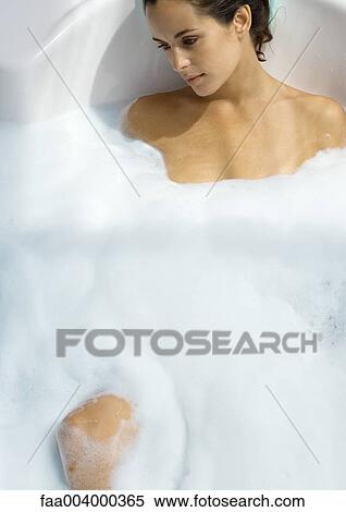Woman taking bubble bath View Large Photo Image Stock Photography - Woman taking bubble bath. Fotosearch