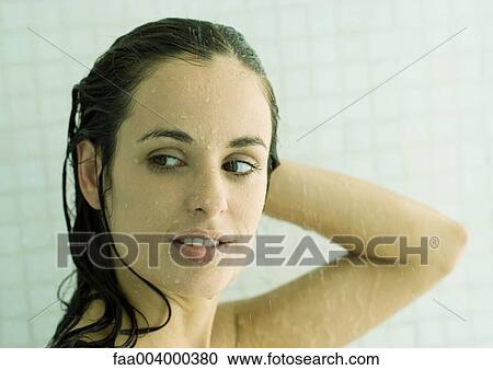 Woman taking shower View Large Photo Image Stock Image - Woman taking shower. Fotosearch