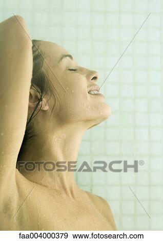 Woman taking shower View Large Photo Image Stock Photo - Woman taking shower. Fotosearch