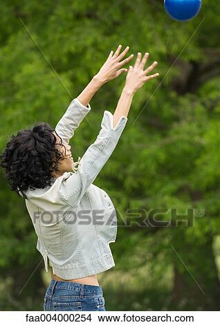 Woman throwng ball View Large Photo Image Picture - Woman throwng ball. Fotosearch