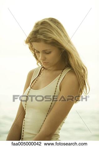Woman with head down View Large Photo Image Stock Image - Woman with head down. Fotosearch
