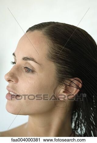 Stock Image - Woman with wet hair. Fotosearch