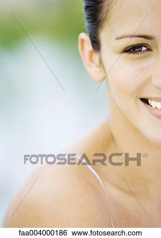 Woman's face and shoulder, cropped View Large Photo Image Stock Photograph - Woman's face and shoulder, cropped. Fotosearch