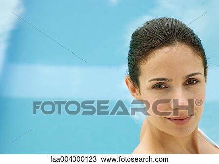 Woman's face, pool in background View Large Photo Image Stock Image - Woman's face, pool in background. Fotosearch