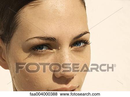 Woman's wet face, cropped View Large Photo Image Stock Photo - Woman's wet face, cropped. Fotosearch