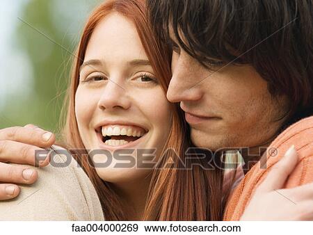 Young couple embracing View Large Photo Image Stock Photo - Young couple embracing. Fotosearch