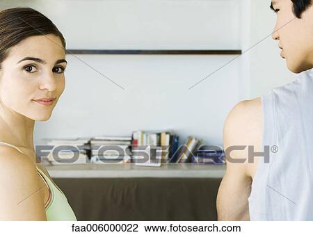 Young man and woman in dorm room, cropped View Large Photo Image Stock Image - Young man and woman in dorm room, cropped. Fotosearch