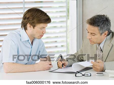 Young man interviewing for job View Large Photo Image Stock Photograph - Young man interviewing for job. Fotosearch