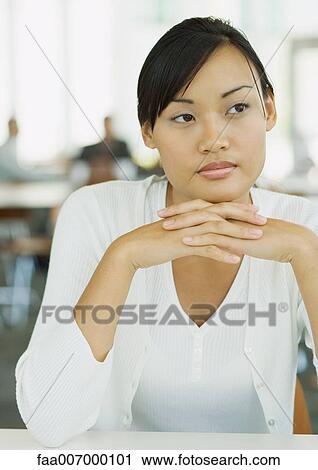 Stock Image - Young woman, portrait. Fotosearch