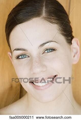 Young woman's face, close-up View Large Photo Image Stock Image - Young woman's face, close-up. Fotosearch