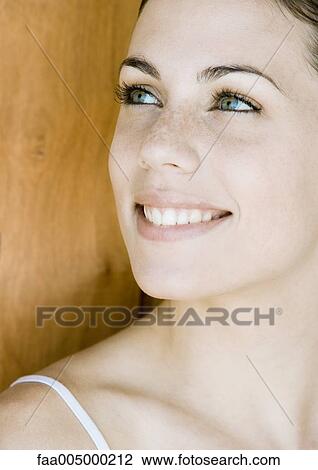 Young woman's face, close-up View Large Photo Image Stock Image - Young woman's face, close-up. Fotosearch