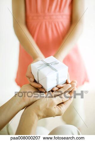 Stock Photo - Gift giving. Fotosearch