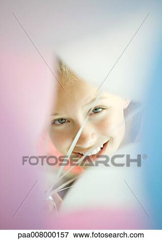 Girl looking through bunch of balloons View Large Photo Image Stock Photo - Girl looking through bunch of balloons. Fotosearch