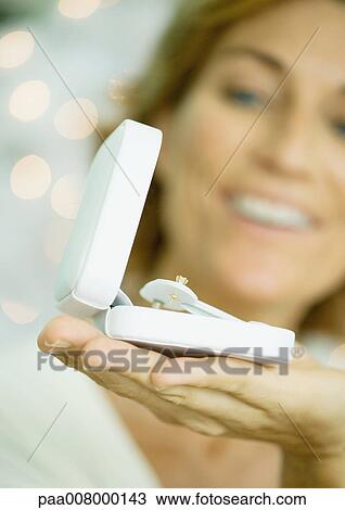 Jewellery box held up by woman View Large Photo Image Stock Image - Jewellery box held up by woman. Fotosearch