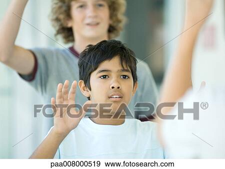 Preteen boys waving View Large Photo Image Stock Photo - Preteen boys waving. Fotosearch