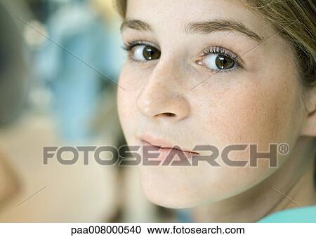 Preteen girl, close-up of face View Large Photo Image Stock Image - Preteen girl, close-up of face. Fotosearch