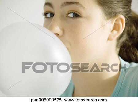 Teenage girl blowing bubble View Large Photo Image Stock Photography - Teenage girl blowing bubble. Fotosearch