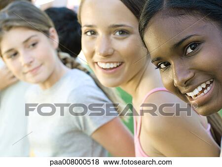 Teenager girls smiling View Large Photo Image Stock Photo - Teenager girls smiling. Fotosearch