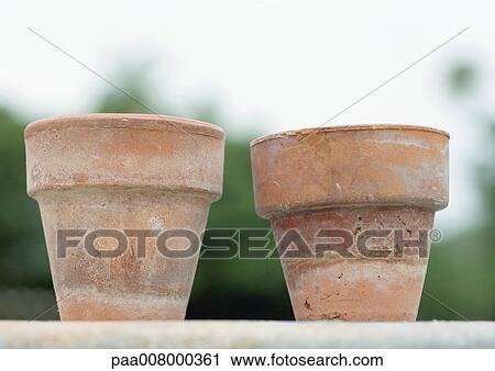 Two terracotta pots View Large Photo Image Stock Image - Two terracotta pots. Fotosearch