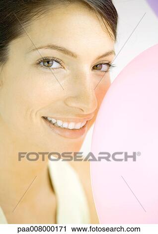 Woman with balloon View Large Photo Image Stock Image - Woman with balloon. Fotosearch