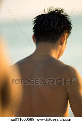 Barechested man, rear view View Large Photo Image Stock Photo - Barechested man, rear view. Fotosearch