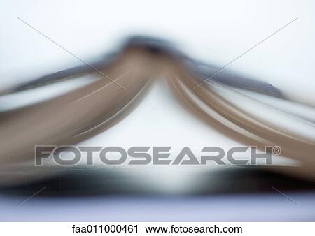 Book, face down, defocused View Large Photo Image Stock Image - Book, face down, defocused. Fotosearch