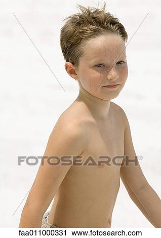 Boy on beach, portrait View Large Photo Image Stock Image - Boy on beach, portrait. Fotosearch