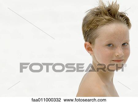 Boy on beach, portrait View Large Photo Image Stock Image - Boy on beach, portrait. Fotosearch