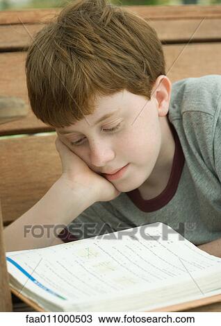 Boy studying View Large Photo Image Stock Image - Boy studying. Fotosearch