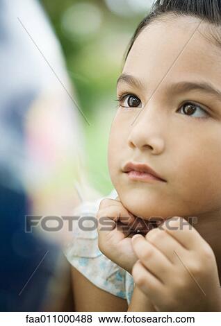 Girl looking at globe View Large Photo Image Stock Photo - Girl looking at globe. Fotosearch