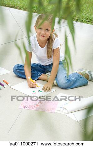 Girl sitting on driveway, drawing View Large Photo Image Stock Image - Girl sitting on driveway, drawing. Fotosearch