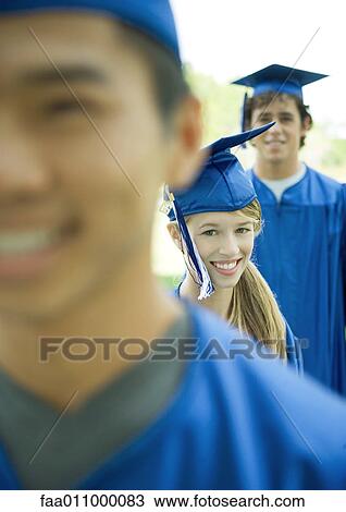 Graduates, focus on young woman View Large Photo Image Stock Image - Graduates, focus on young woman. Fotosearch