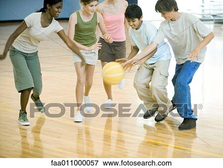 High school students playing basketball in school gym View Large Photo Image Stock Photo - High school students playing basketball in school gym. Fotosearch