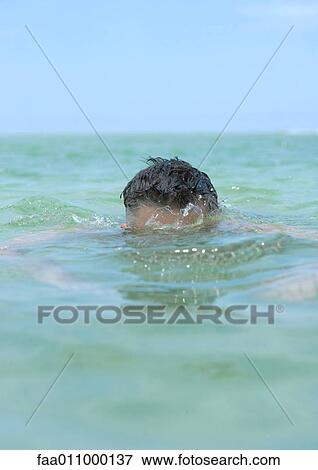 Man partially underwater View Large Photo Image Stock Photo - Man partially underwater. Fotosearch