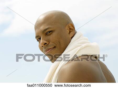 Man with towel around neck View Large Photo Image Stock Image - Man with towel around neck. Fotosearch