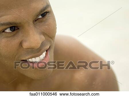 Man's wet face, close-up View Large Photo Image Stock Photograph - Man's wet face, close-up. Fotosearch