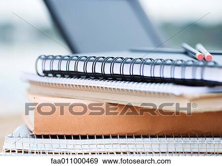 Stack on books and notebooks View Large Photo Image Stock Photo - Stack on books and notebooks. Fotosearch