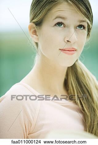 Teenage girl, raising eyebrows, portrait View Large Photo Image Picture - Teenage girl, raising eyebrows, portrait. Fotosearch