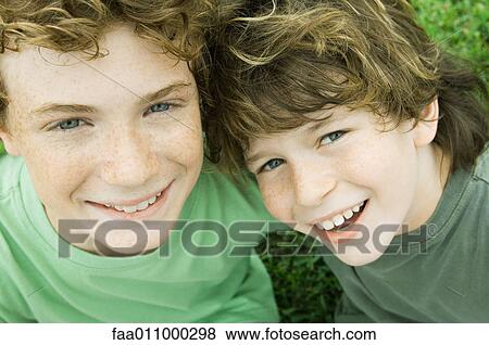 Two boys, portrait, high angle view View Large Photo Image Stock Photo - Two boys, portrait, high angle view. Fotosearch